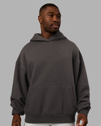 Man wearing MVP Oversized Hoodie - Dark Storm | Model:Sam | Size:L