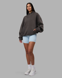Woman wearing MVP Oversized Hoodie - Dark Storm | Model:Rhiley | Size:L
