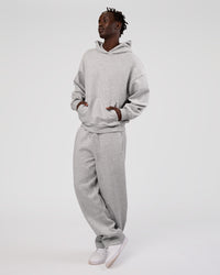 Man wearing MVP Oversized Hoodie - Light Grey Marl | Model:Okello | Size:L