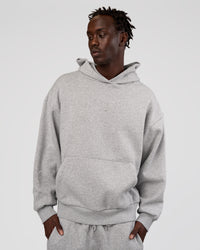 Man wearing MVP Oversized Hoodie - Light Grey Marl | Model:Okello | Size:L
