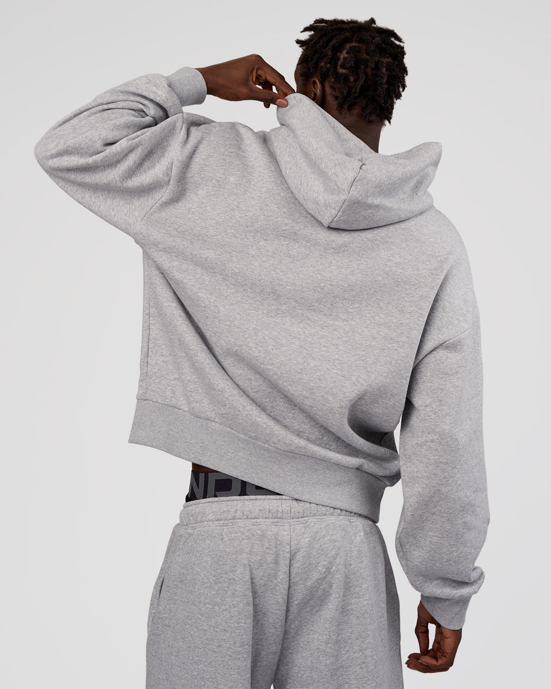 Man wearing MVP Oversized Hoodie - Light Grey Marl | Model:Okello | Size:L