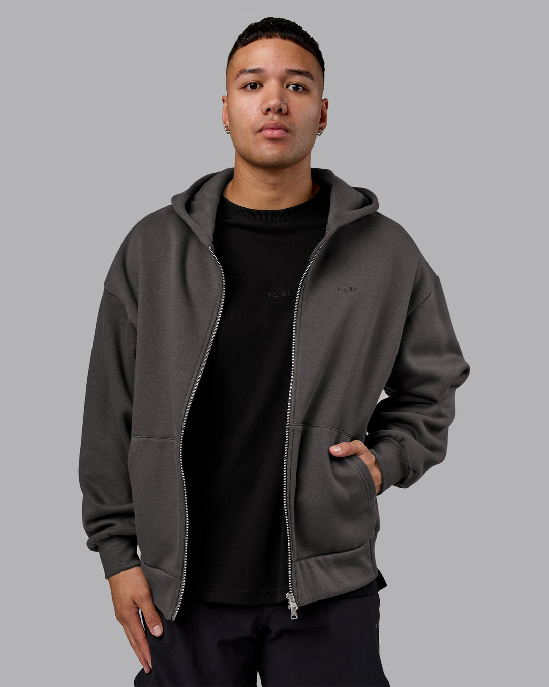 Man wearing MVP Zip Through Oversized Hoodie - Dark Storm | Model:Kaelyb | Size:L