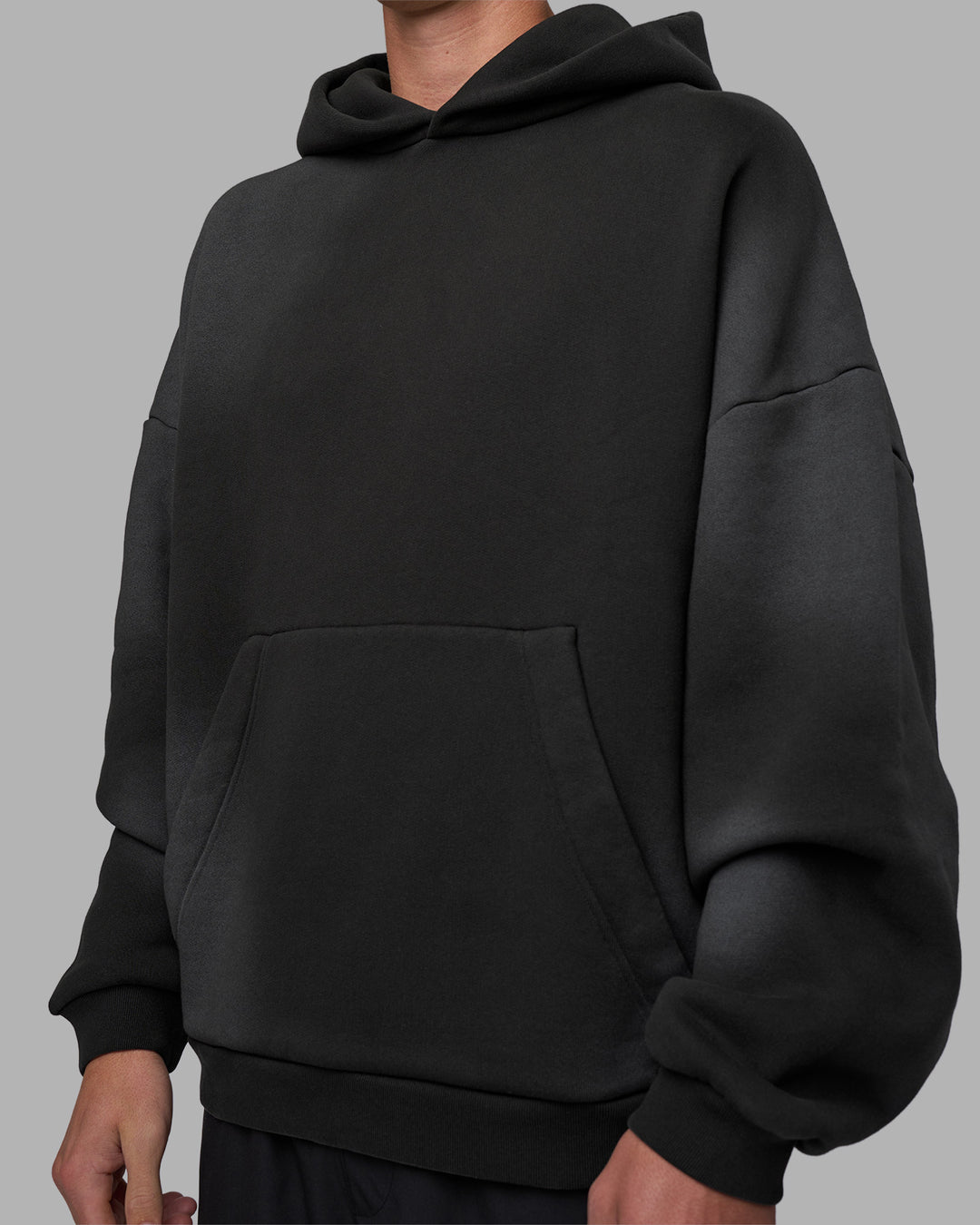 Man wearing Memory In Motion 500gsm Ultra Heavyweight Washed Hoodie - Charcoal Washed | Model:Brandon | Size:L