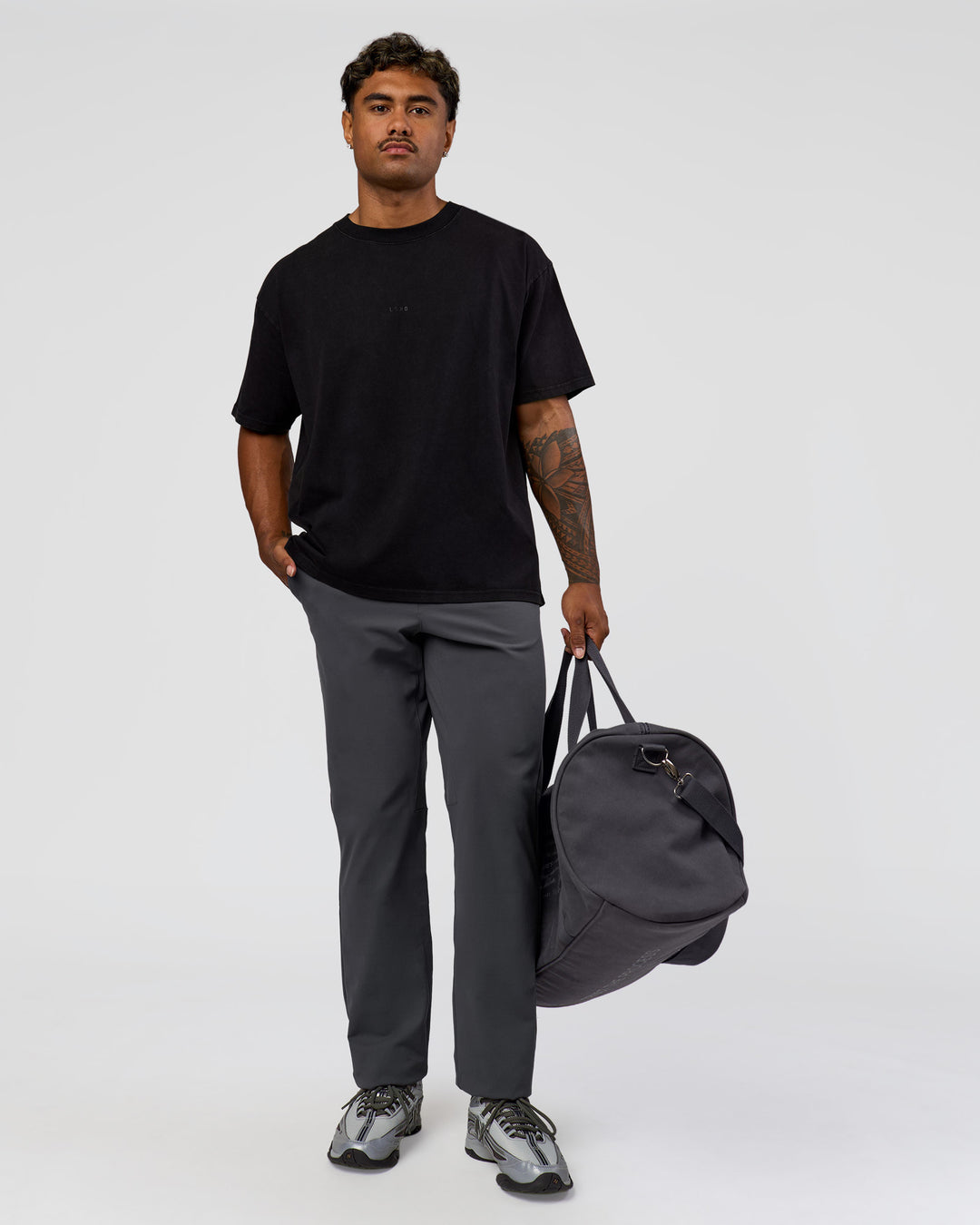 Man wearing Memory in Motion Heavyweight Oversized Tee - Black Washed | Model:Xav | Size:L