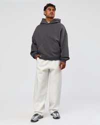 Man wearing Memory In Motion Ultra Heavyweight Washed Hoodie - Dark Storm Washed | Model:Xav | Size:L