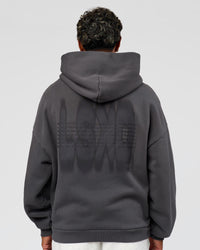 Man wearing Memory In Motion Ultra Heavyweight Washed Hoodie - Dark Storm Washed | Model:Xav | Size:L