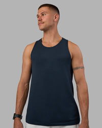 Man wearing AeroFLX+ Seamless Tank - Navy/Navy | Model:Nikola | Size:L