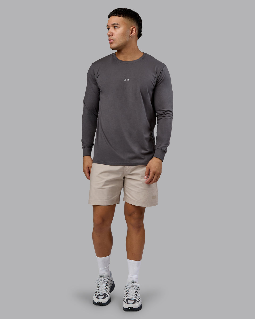 Man wearing Base FLXCotton Long Sleeve Tee - Dark Storm | Model:Kaelyb | Size:L