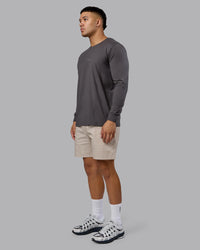Man wearing Base FLXCotton Long Sleeve Tee - Dark Storm | Model:Kaelyb | Size:L