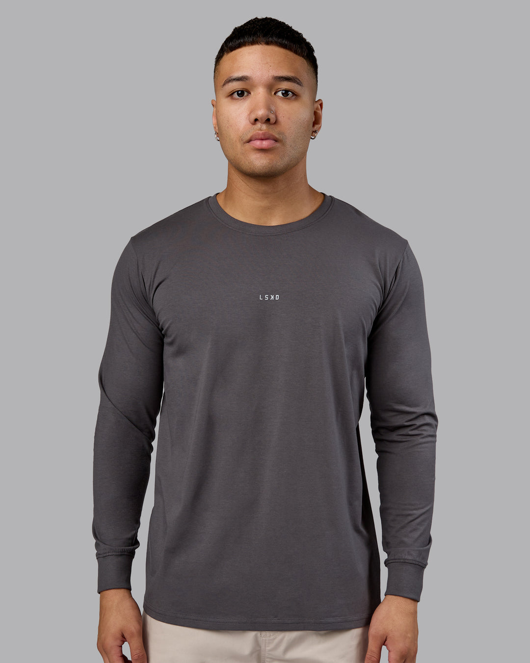 Man wearing Base FLXCotton Long Sleeve Tee - Dark Storm | Model:Kaelyb | Size:L