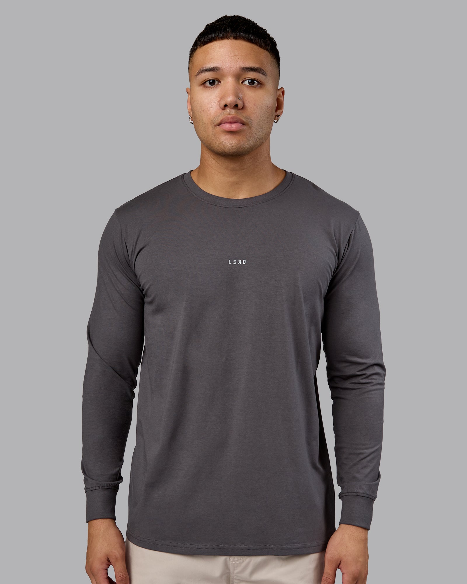 Man wearing Base FLXCotton Long Sleeve Tee - Dark Storm | Model:Kaelyb | Size:L