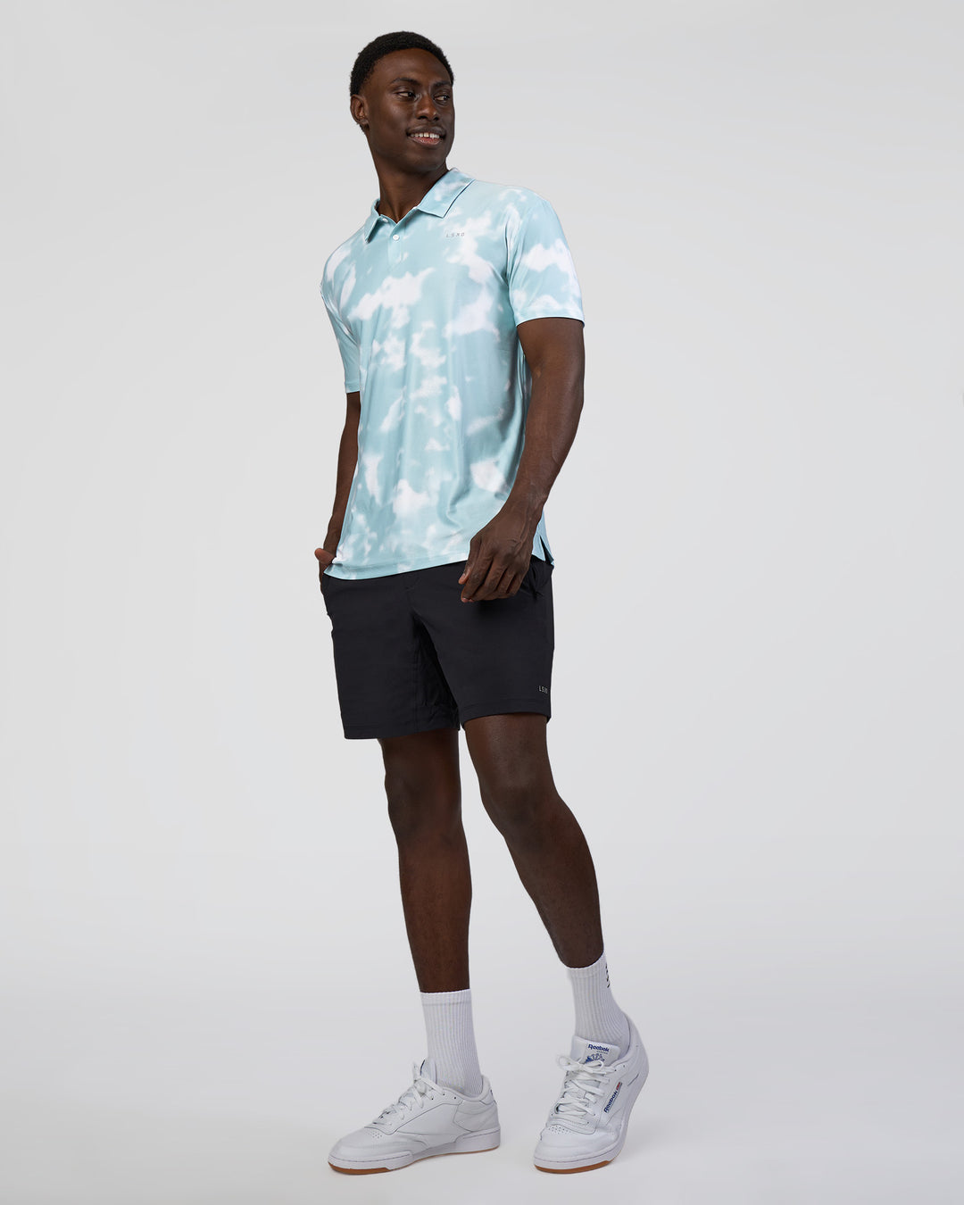 Man wearing Drive Polo - Sky Washed Camo | Model:Paabio | Size:L