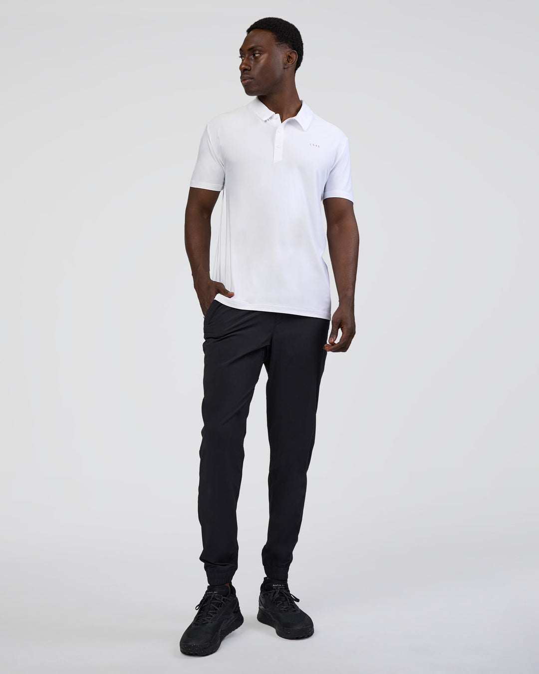 Man wearing Drive Polo - White | Model:Paabio | Size:L