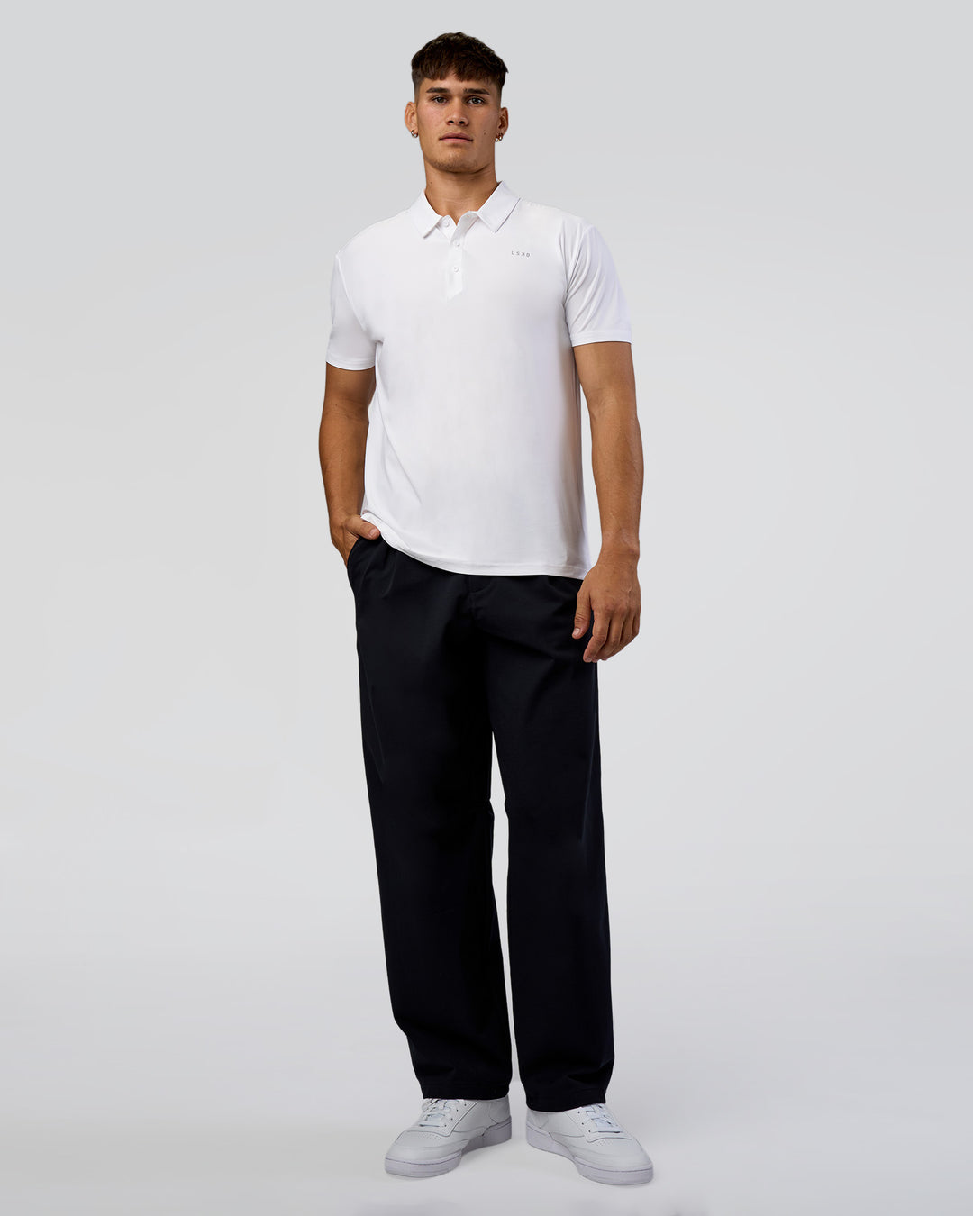 Man wearing Drive Polo - White | Model:Jackson | Size:L