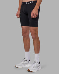 Man wearing Men's Perform Short Tight - Black | Model:Brandon | Size:L