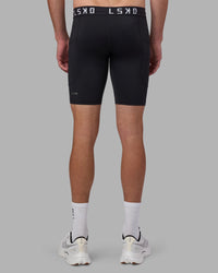 Man wearing Men's Perform Short Tight - Black | Model:Brandon | Size:L