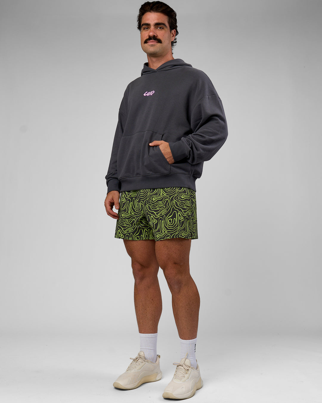 Man wearing Miami Vibe Oversized Hoodie - Dark Storm-Marshmallow | Model:Adam | Size:L
