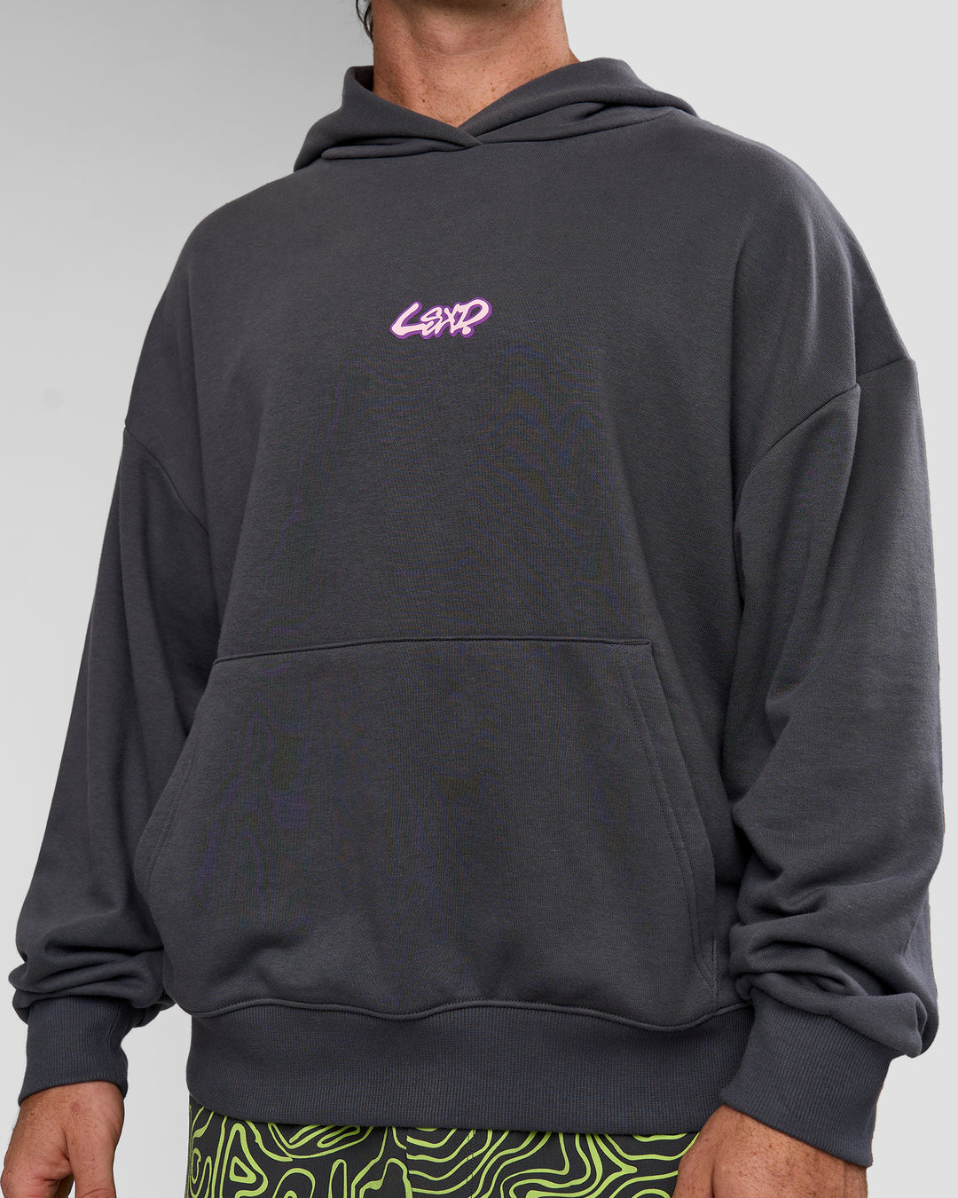 Man wearing Miami Vibe Oversized Hoodie - Dark Storm-Marshmallow | Model:Adam | Size:L