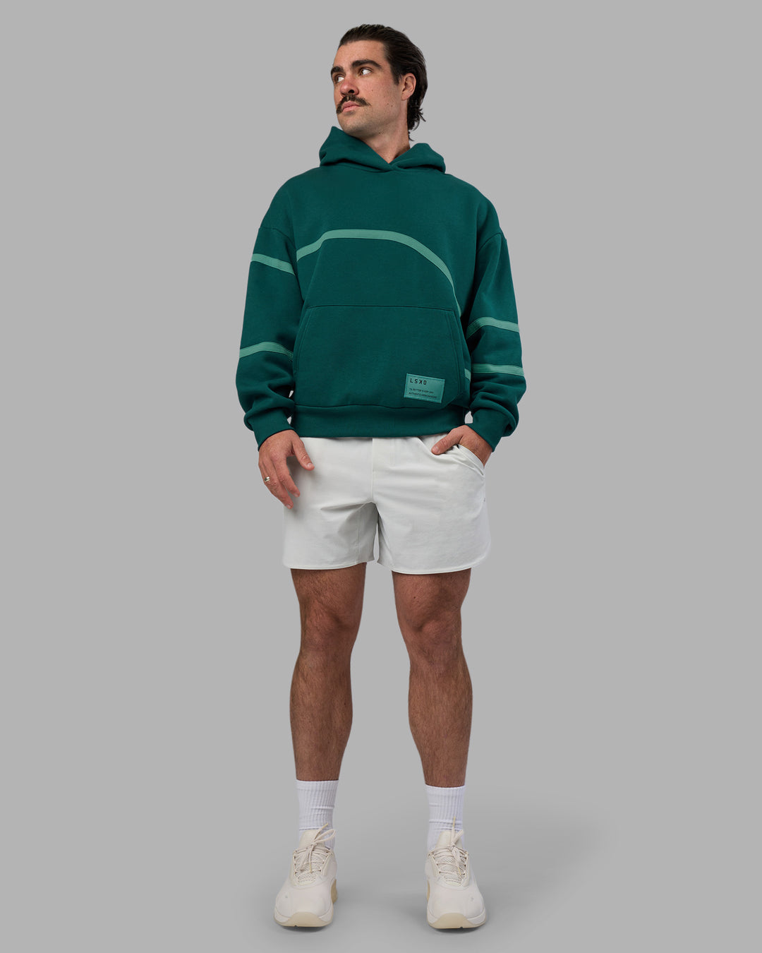 Man wearing Movement Oversized Hoodie - Dark Moss-Agate Green | Model:Adam | Size:L