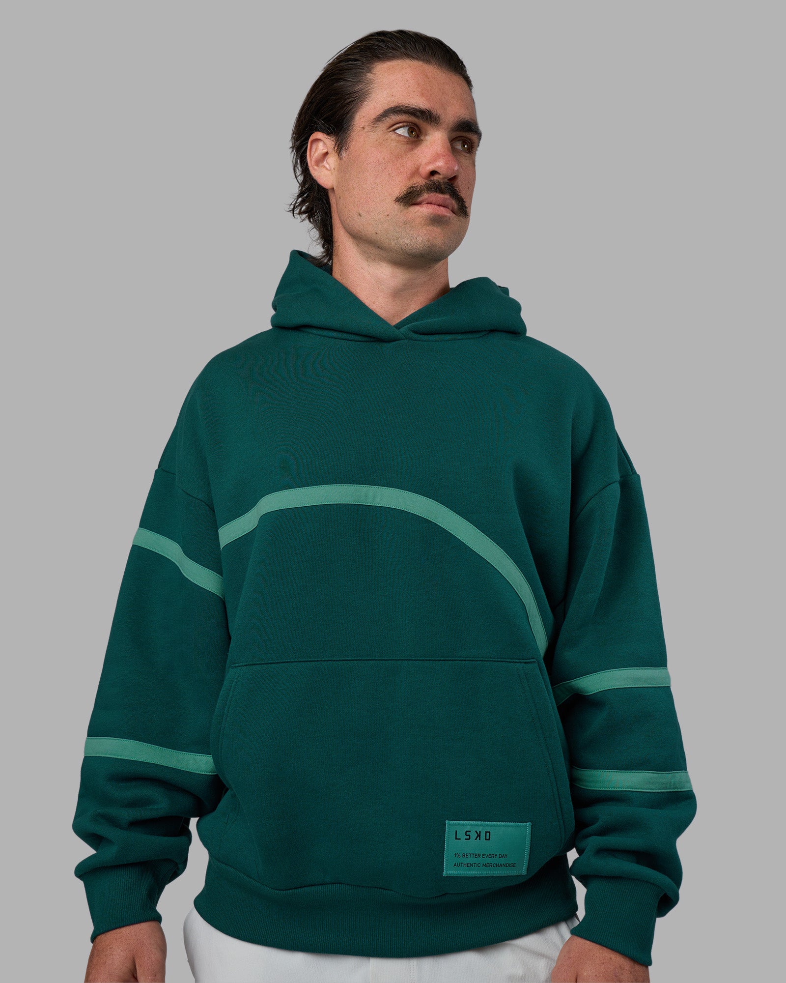 Man wearing Movement Oversized Hoodie - Dark Moss-Agate Green | Model:Adam | Size:L