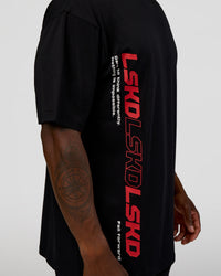 Man wearing Nothing Is Impossible FLXCotton Oversized Tee - Black-Flame | Model:Sam | Size:L