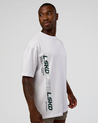 Man wearing Nothing Is Impossible FLXCotton Oversized Tee - White-Vital Green | Model:Sam | Size:L