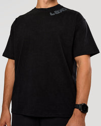 Man wearing Offset Heavyweight Unisex Oversized Tee - Black Washed-Castlerock | Model:Liam | Size:L