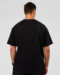 Man wearing Offset Heavyweight Unisex Oversized Tee - Black Washed-Castlerock | Model:Liam | Size:L
