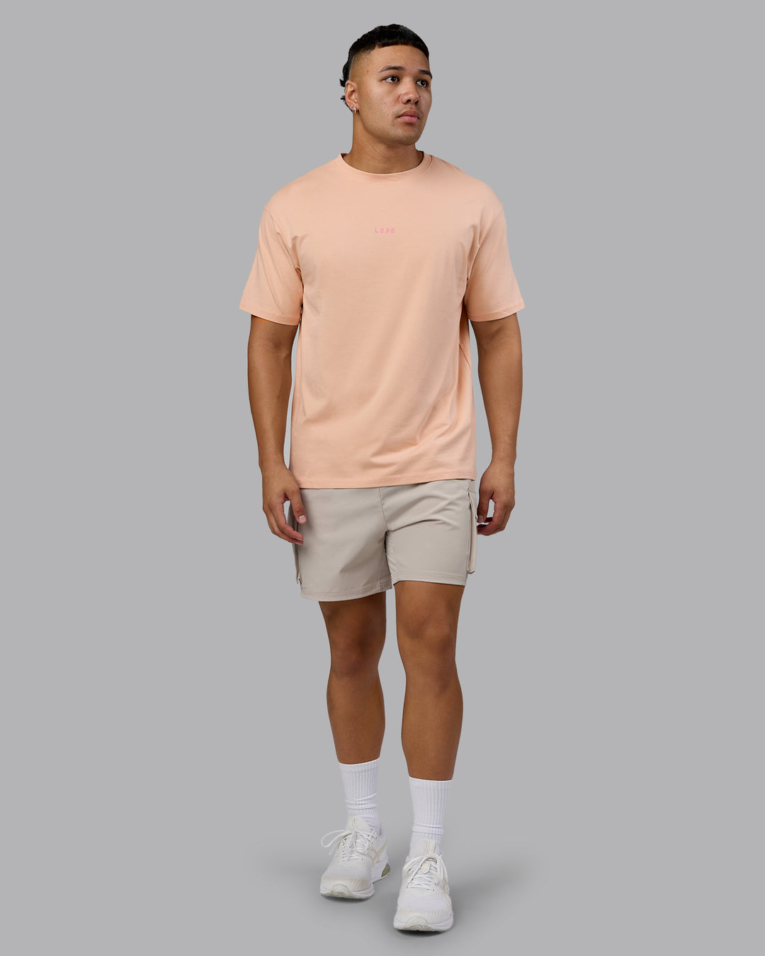 Man wearing On Repeat FLXCotton Oversized Tee - Cameo Rose-Candy Pink | Model:Kaelyb | Size:L