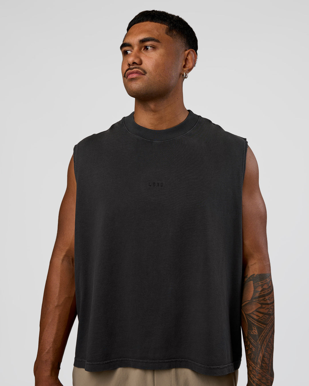 Man wearing Oversized Heavyweight Boxed Tank - Washed Black | Model:Xav | Size:L