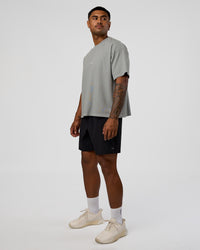Man wearing Oversized Heavyweight Boxed Tee - Light Grey Marl | Model:Xav | Size:L