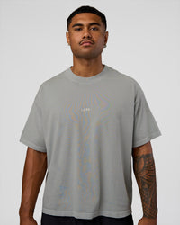 Man wearing Oversized Heavyweight Boxed Tee - Light Grey Marl | Model:Xav | Size:L