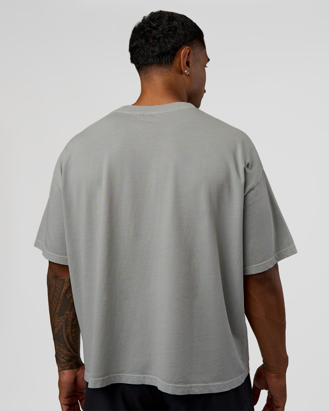 Man wearing Oversized Heavyweight Boxed Tee - Light Grey Marl | Model:Xav | Size:L