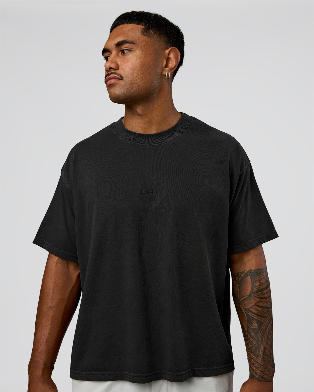 Man wearing Oversized Heavyweight Boxed Tee - Washed Black | Model:Xav | Size:L