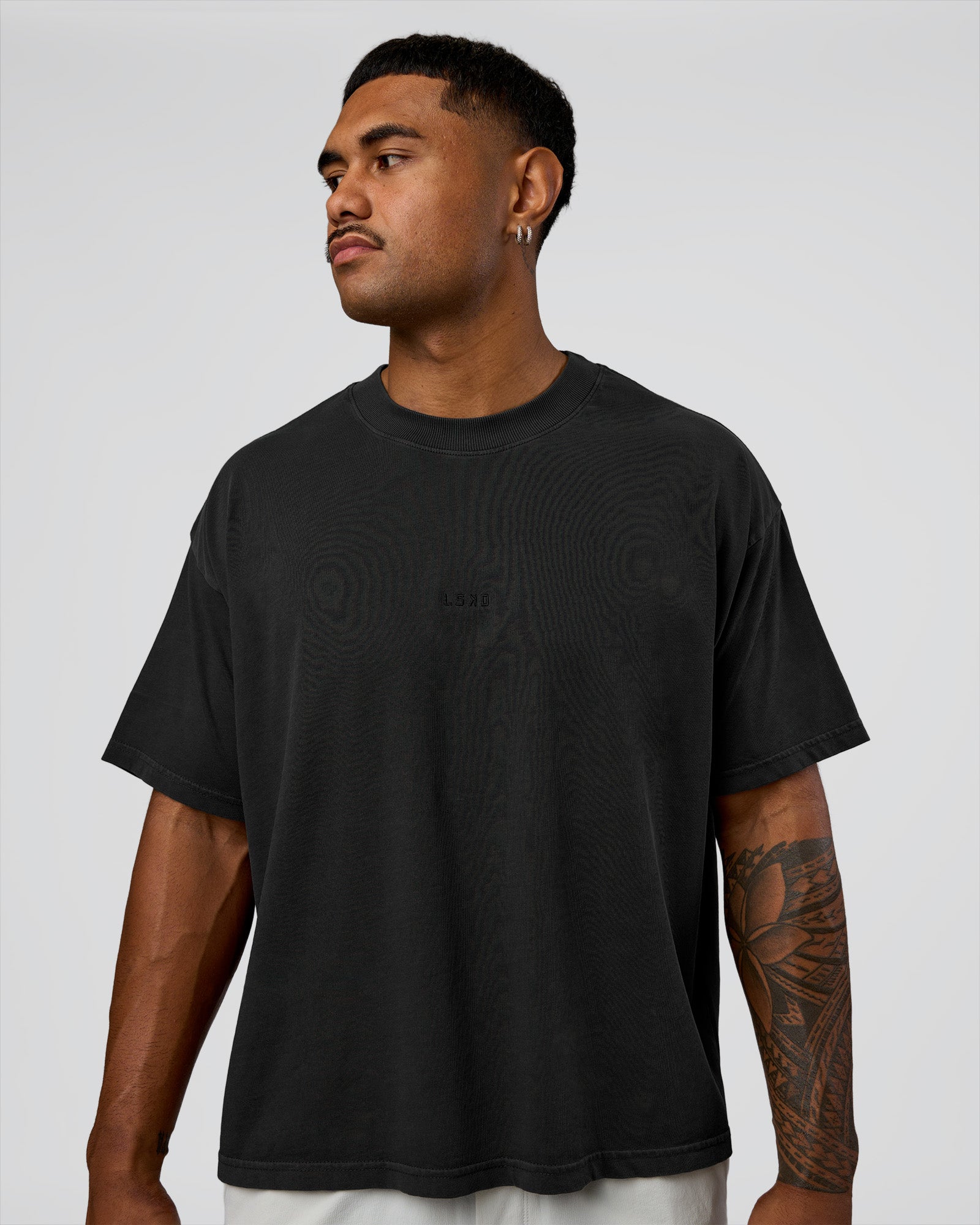 Man wearing Oversized Heavyweight Boxed Tee - Washed Black | Model:Xav | Size:L