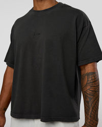 Man wearing Oversized Heavyweight Boxed Tee - Washed Black | Model:Xav | Size:L