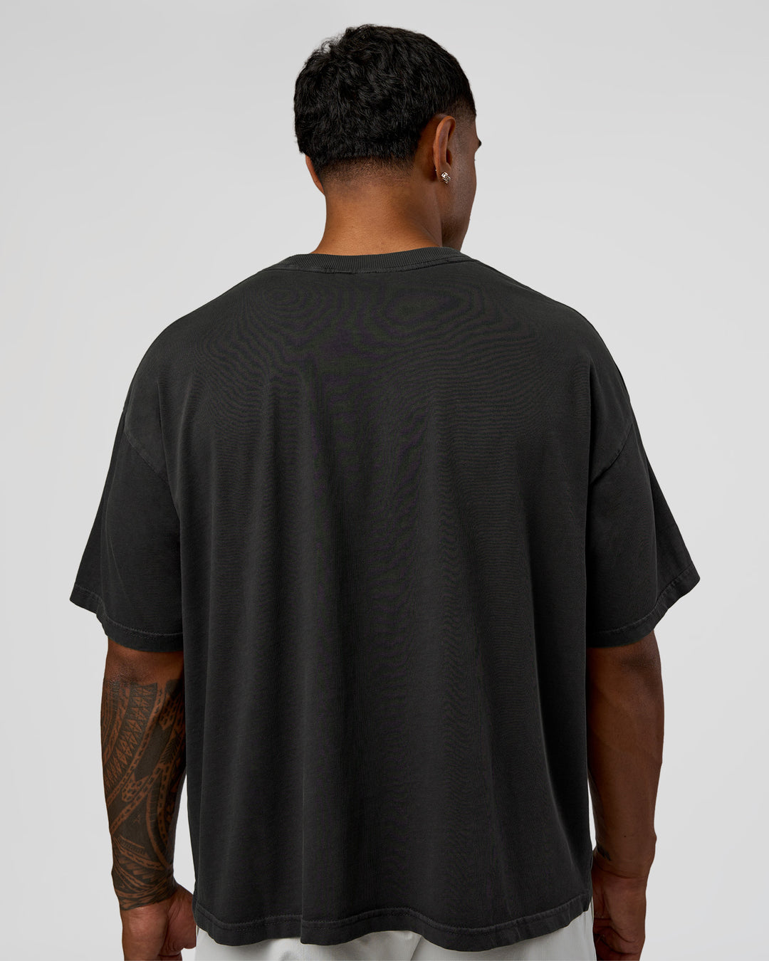 Man wearing Oversized Heavyweight Boxed Tee - Washed Black | Model:Xav | Size:L
