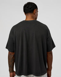 Man wearing Oversized Heavyweight Boxed Tee - Washed Black | Model:Xav | Size:L