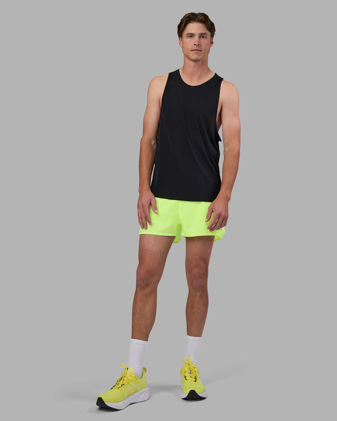 Man wearing Pace 3&quot; Performance Short - Lime Glo | Model:Brandon | Size:L