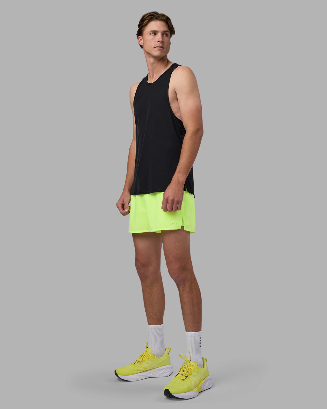 Man wearing Pace 3&quot; Performance Short - Lime Glo | Model:Brandon | Size:L
