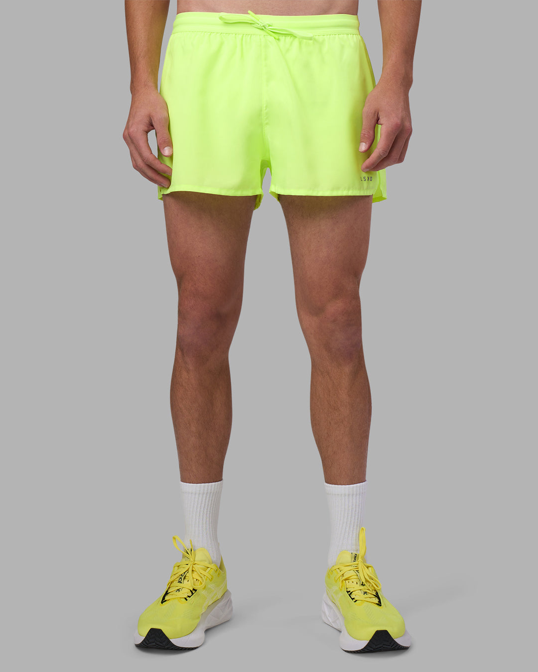 Man wearing Pace 3&quot; Performance Short - Lime Glo | Model:Brandon | Size:L