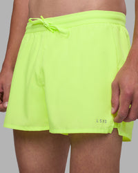 Man wearing Pace 3" Performance Short - Lime Glo | Model:Brandon | Size:L