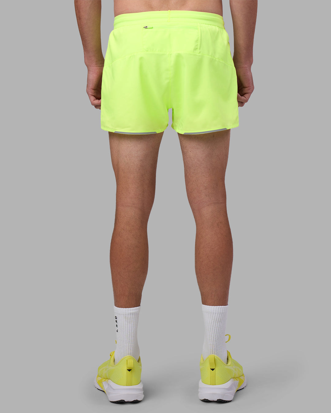 Man wearing Pace 3&quot; Performance Short - Lime Glo | Model:Brandon | Size:L