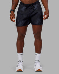 Man wearing Pace 5" Lined Performance Short - Washed Black | Model:Sam | Size:L