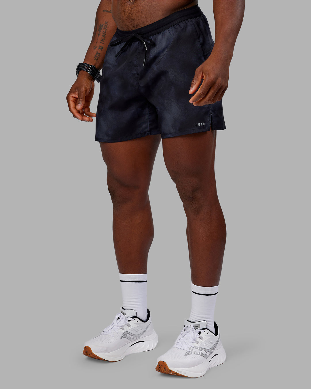 Man wearing Pace 5&quot; Lined Performance Short - Washed Black | Model:Sam | Size:L