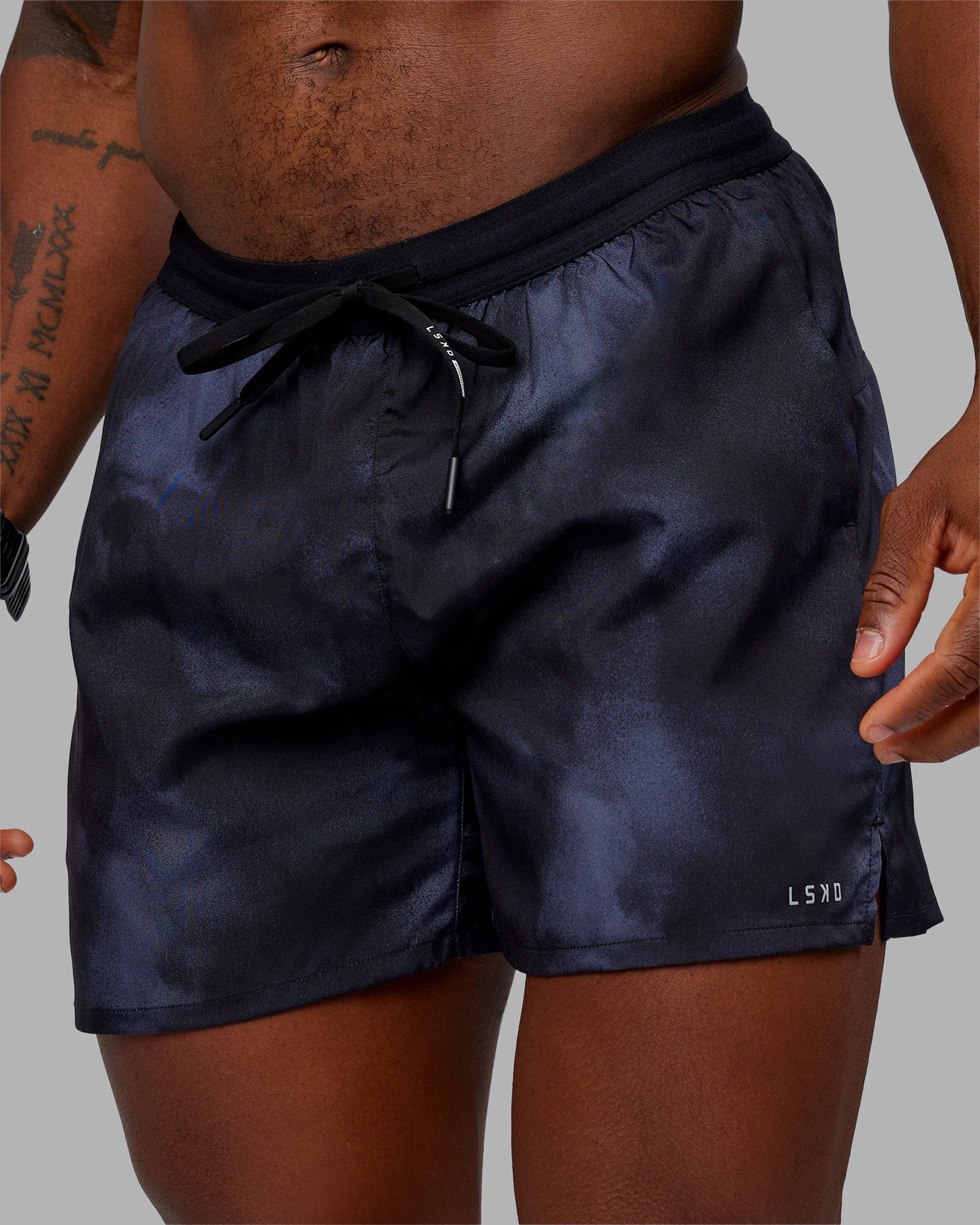 Man wearing Pace 5" Lined Performance Short - Washed Black | Model:Sam | Size:L