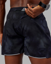 Man wearing Pace 5" Lined Performance Short - Washed Black | Model:Sam | Size:L