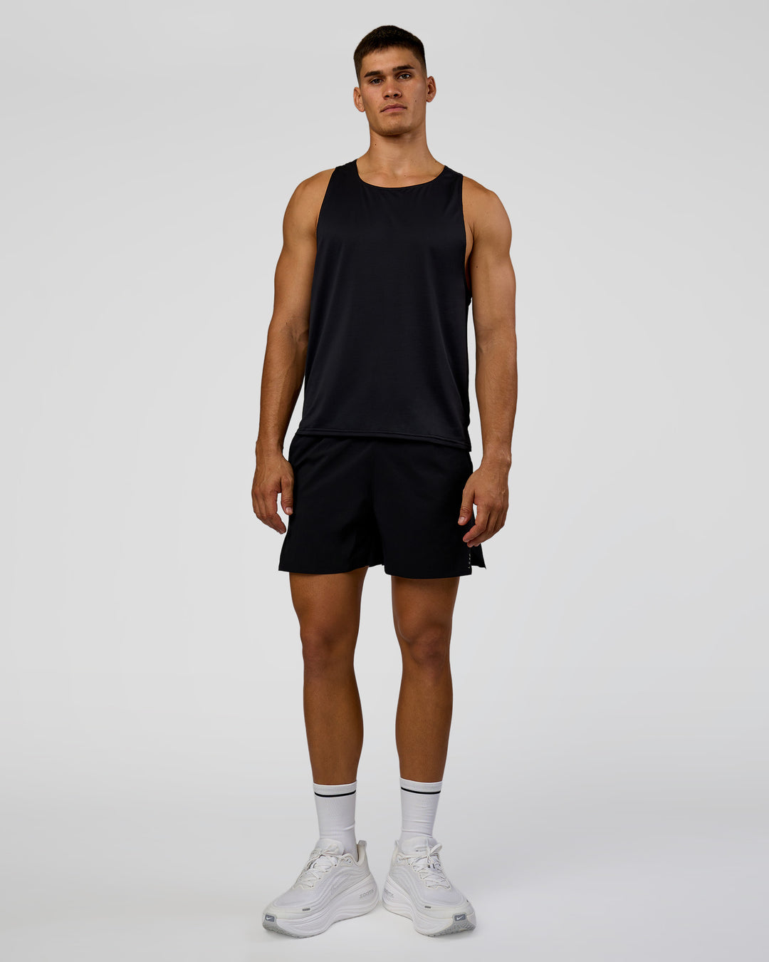 Man wearing Pace Running Tank 3.0  - Black | Model:Jackson | Size:L