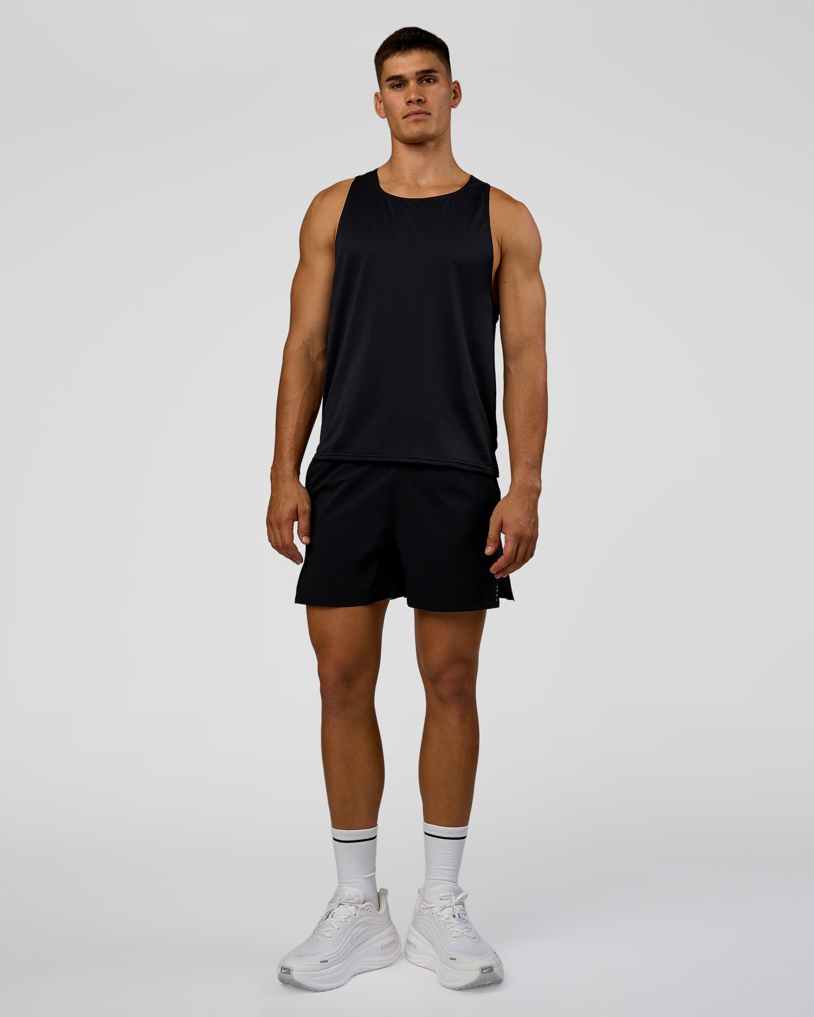 Man wearing Pace Running Tank 3.0  - Black | Model:Jackson | Size:L