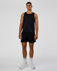 Man wearing Pace Running Tank 3.0  - Black | Model:Jackson | Size:L